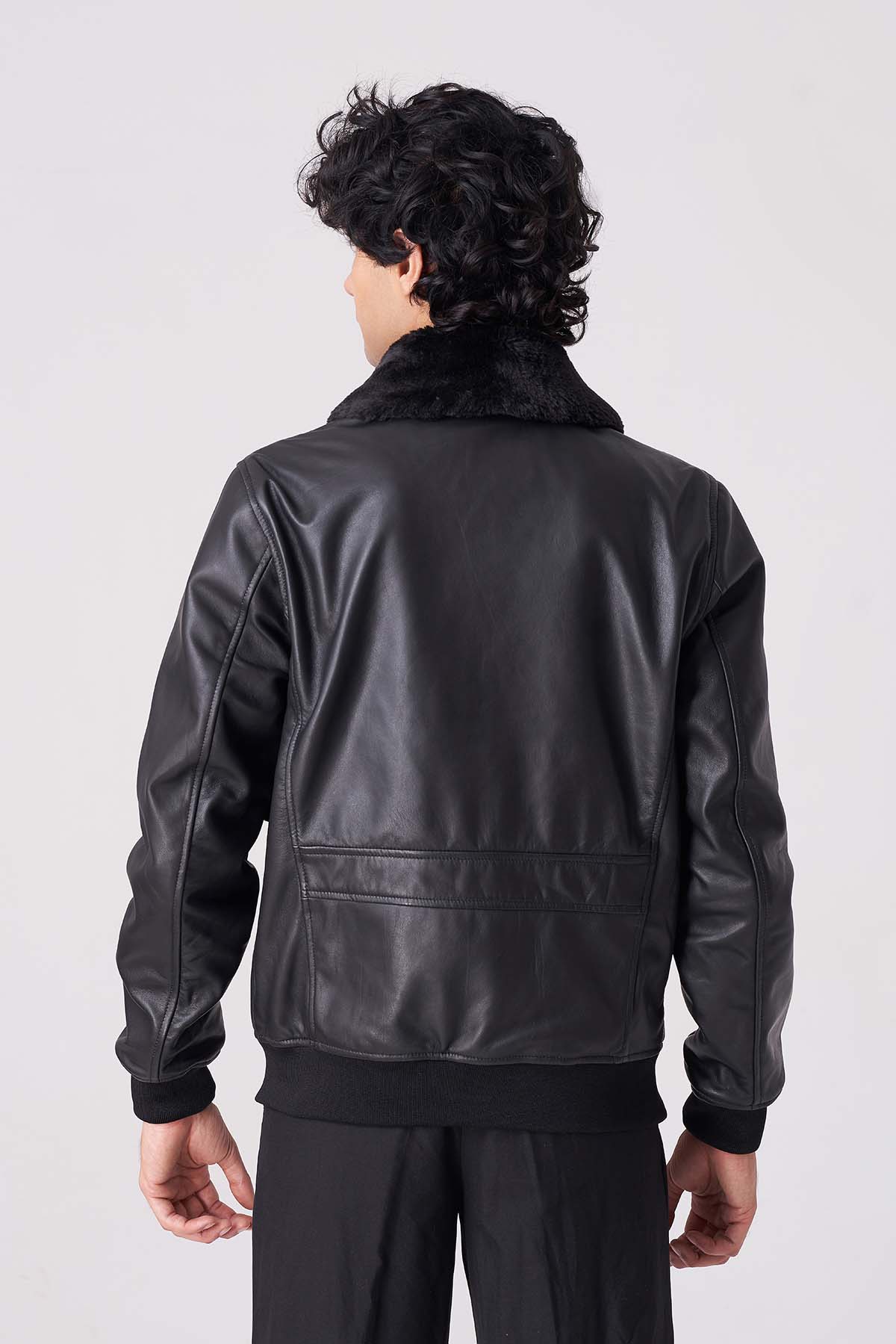 Stylish leather jacket with faux fur collar