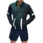 Man wearing a black and green tracksuit with white stripes on a white background