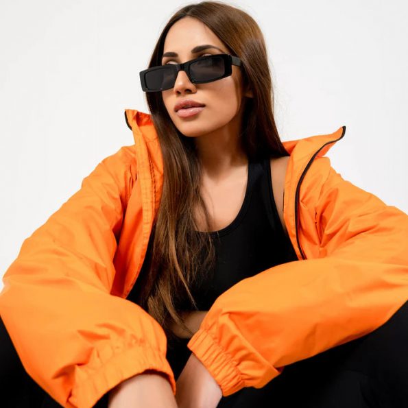 Lightweight orange windbreaker for active wear in USA